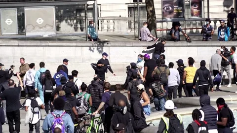 BLM protesters attacking EDL members at Trafalgar square Stock Footage 133090693