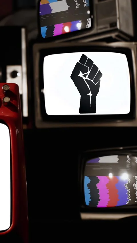 BLM Raised Fist Logo on Multiple Vintage TV Screens - Vertical 4K Stock Footage 284358454