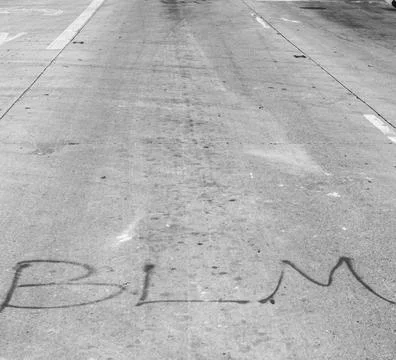 "BLM" on the street Stock Photos