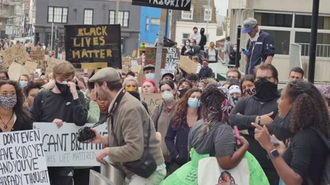 BLM young activist and crowd Stock-Footage 131892635