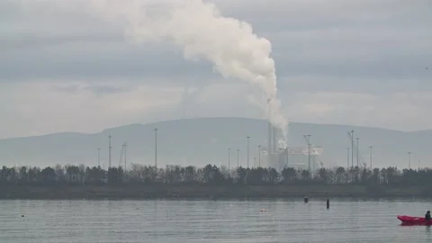 Bloat sailing in front of Poolbeg powerstation Video stock 170896616