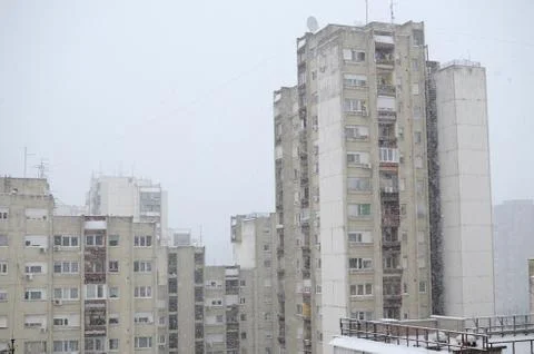 Block of Buildings in Snowfall Stock Photos