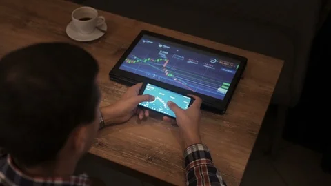 Block-chain, trading online, Cryptocurrency trend graph. Man at table touching Stock Footage 117066431