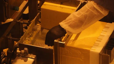 A Block of Cheddar cheese being cut down 2 Видео 39173409