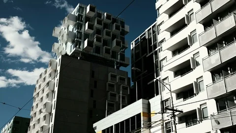 Block of flats in front of fast moving clouds Stock Footage 87459273