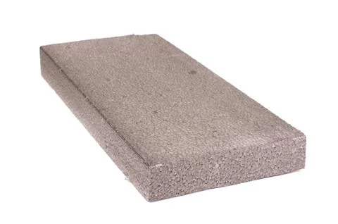 Block of graphite polystyrene isolated on the white background Foto stock