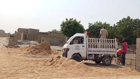 Block Industry Workers Loading Cement Blocks On Small Truck Kano Nigeria Vídeo Stock 328222938