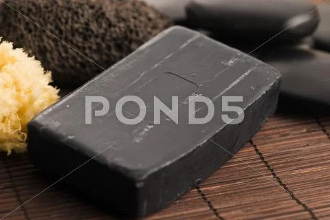 Block of natural carbon soap Stock Photos