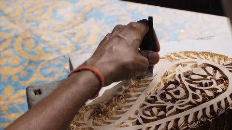 Block Printing - A craftsman is creating a beautiful design for printing bloc... Stock-Footage 120777290