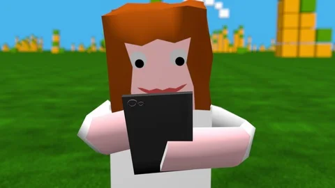 Block style game avatar using smart phone Stock Footage 94824819