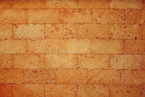 Block wall texture orange color 库存照片