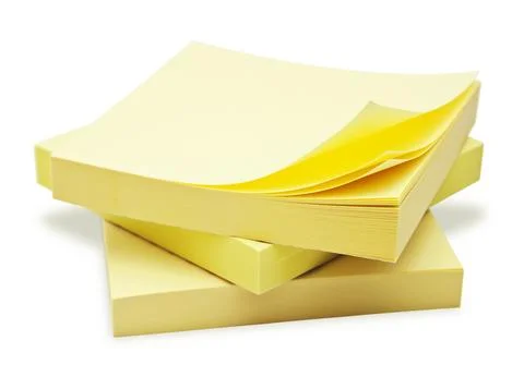 Block of yellow Post it Notes isolated on white. Stock Photos