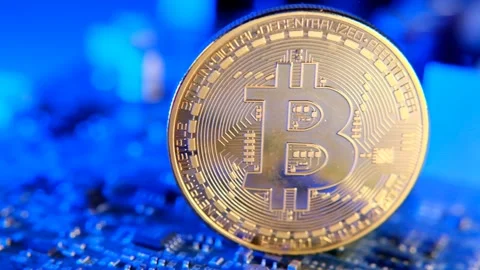 Blockchain cryptocurrency.Bitcoin.Silver bitcoin on a microcircuit Stock Footage 154390463