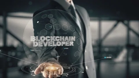 Blockchain Developer with hologram businessman concept Stock Footage 152095840