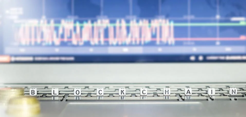 Blockchain dices on lap Stock Photos