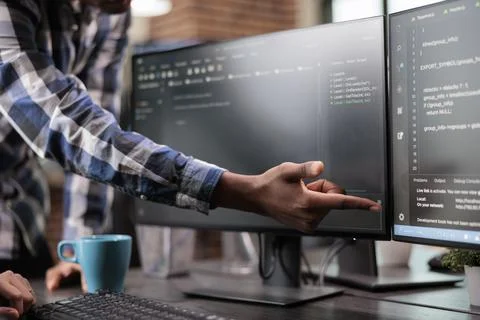 Blockchain engineer pointing out mistake in network security software line code. Foto stock