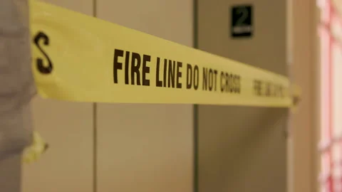 Blocked elevator with Fire Line Do Not Cross yellow tape 4k 库存影片 278380530