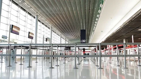Blocking barriers, gates, airport terminal. People walking along airport hall. Stock Footage