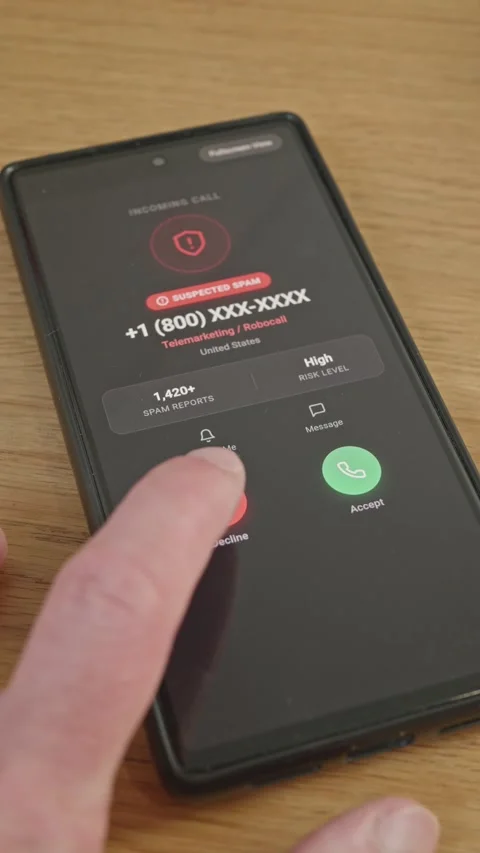 Blocking Robocall and Suspected Spam Number on Modern Smartphone Display Useful Stock Footage 341860561