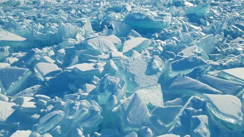 Blocks of broken blue ice on winter Baikal lake at sunset. Stock Footage 223122704