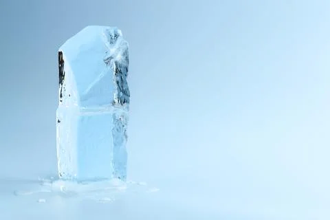 Blocks of clear ice on light blue background, space for text Stock Photos