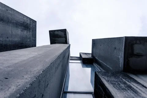 Blocks on either side against sky background Stock Photos