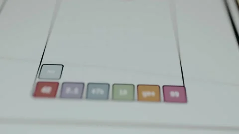 Blocks fall and fill the grid like a spreadsheet game Video stock 331592677