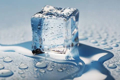 Blocks of Ice With water Drops close-up. Macro ice refreshing cube for a dr.. Stock Photos
