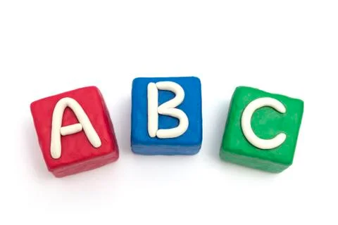 Blocks made of modeling clay with letters ABC, isolated Stock Photos