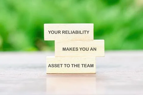 Blocks with motivational text emphasize the importance of reliability as a va Stock Photos