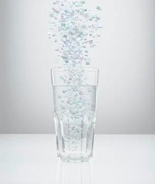 Blocks raining into water glass Stock Photos