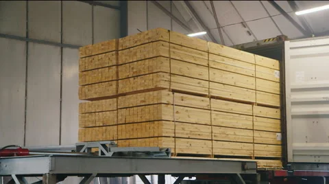 Blocks square timbers loaded into shipping container Stock Footage 62014876