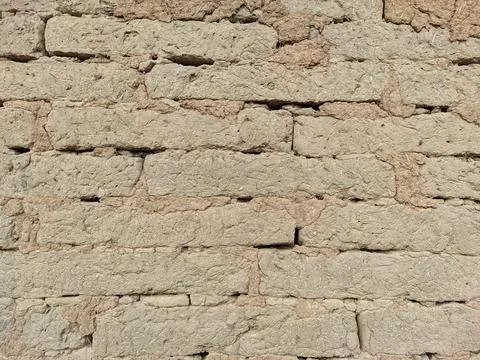The blocks on the wall are made of a mixture of ground and straw. 写真素材