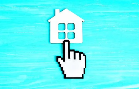 Blocky Mouse Pointer Figurine on a Flat Home Shape Stock Photos