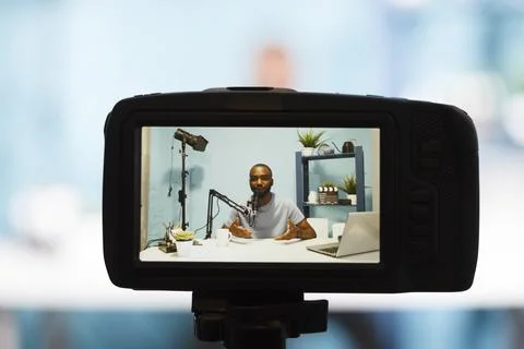 Blogger on camera screen speaking Stock Photos