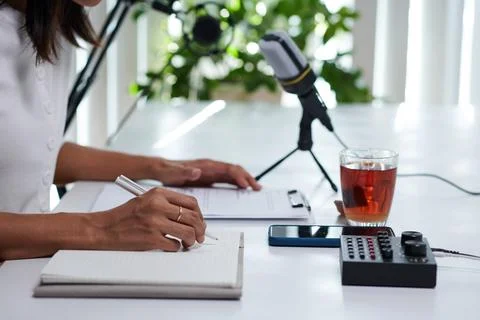 Blogger Checking Script before Recording Podcast Stock Photos