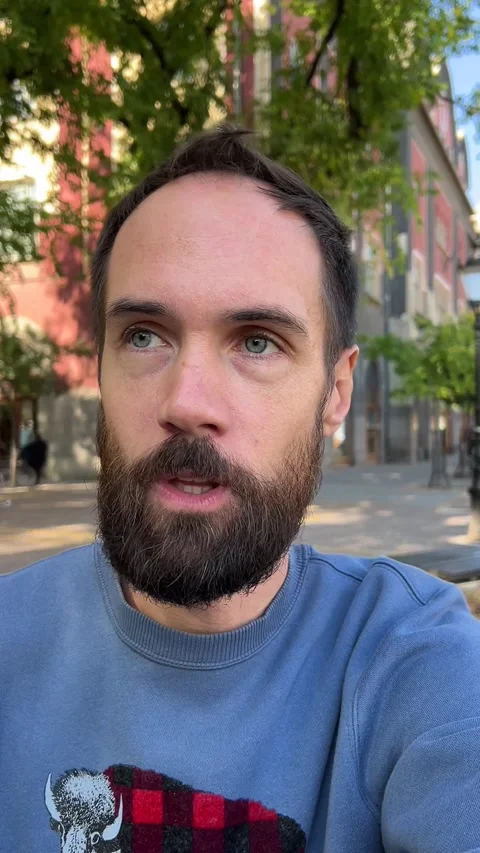 A blogger close-up recording a commentary on camera on a sunny summer day Stock Footage 288117701