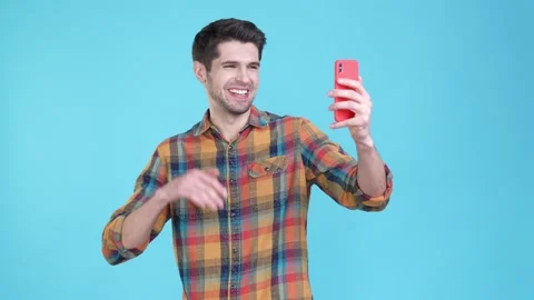 Blogger guy video record live stream gadget isolated blue color background Stock Footage 170130894