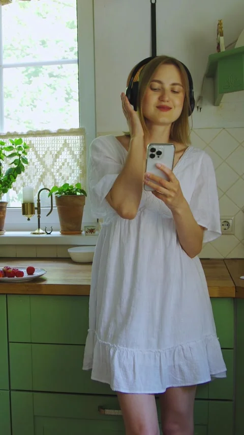 Blogger hosting live broadcast with subscribers. Portrait of cute nice Stock Footage 313118394