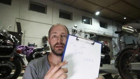Blogger mechanic talks about to-do list for 2022 Stock Footage 162825912