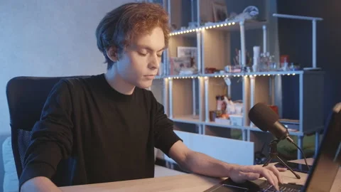 The blogger is preparing for the broadcast, writes text on a laptop. Stock-Footage 204074860