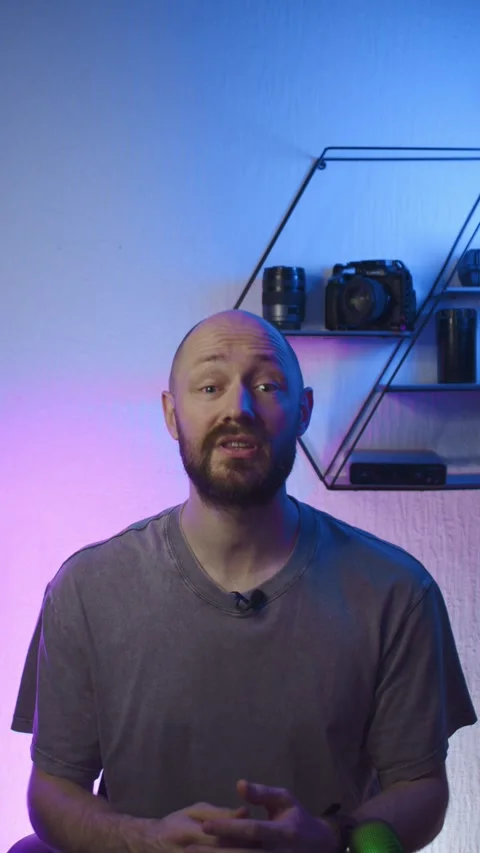 Blogger recording video in front of camera in studio, portrait Stock Footage 304761171