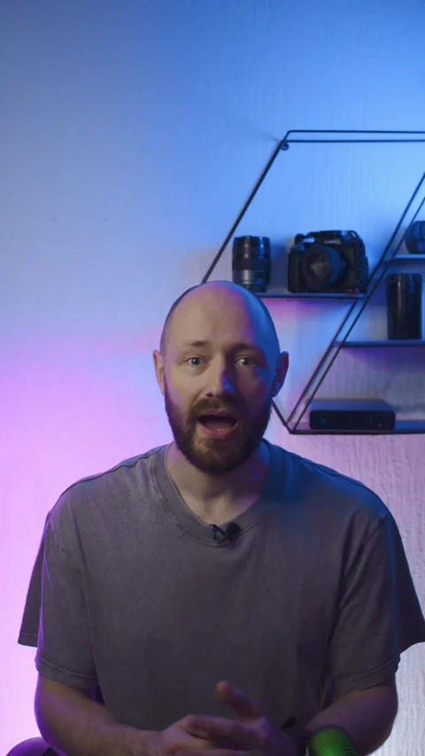 Blogger recording video in front of camera in studio, portrait Stock Footage 304765944