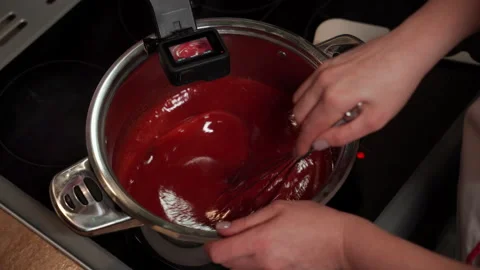 Blogger shoots on action camera step-by-step process of preparing Christmas cake Stock Footage 167272381