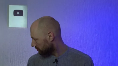 The blogger speaks while looking at the camera Stock Footage 303783590