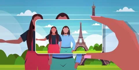 Blogger using smartphone camera photographing african american travelers coup イラスト素材