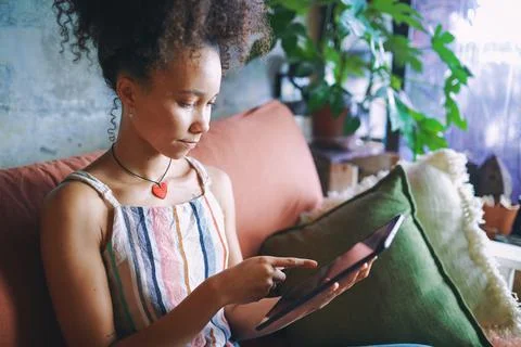 Blogging about the things that mean something to her stock photo... Stock Photos