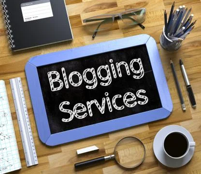 Blogging Services on Small Chalkboard. 3D Stock Illustration