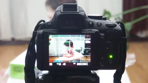 Blogging, technology and people concept boy or blogger camera recording video 库存影片 151035662