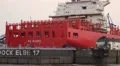 Blohm Voss dock Elbe 17 with container ship Rio Blanco in working progress HD Footage